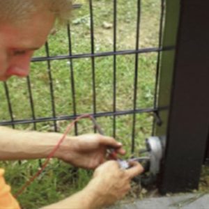 Electrician working on gate | Gate Safe