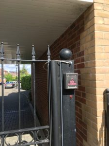 Gate tether on electric gate